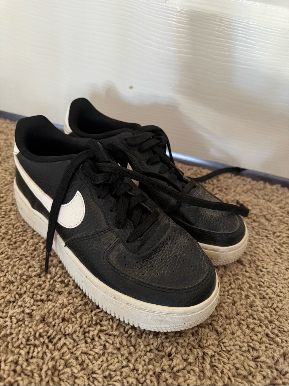 Nike Kids Black Sneakers with White Swoosh